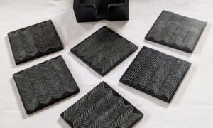 Stone Coasters in Stone Holder with Herringbone engraving (set of 6). 85x85x5mm.