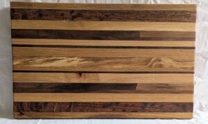Mixed Hardwood Chopping Board with rubber feet. 550x345x25mm.